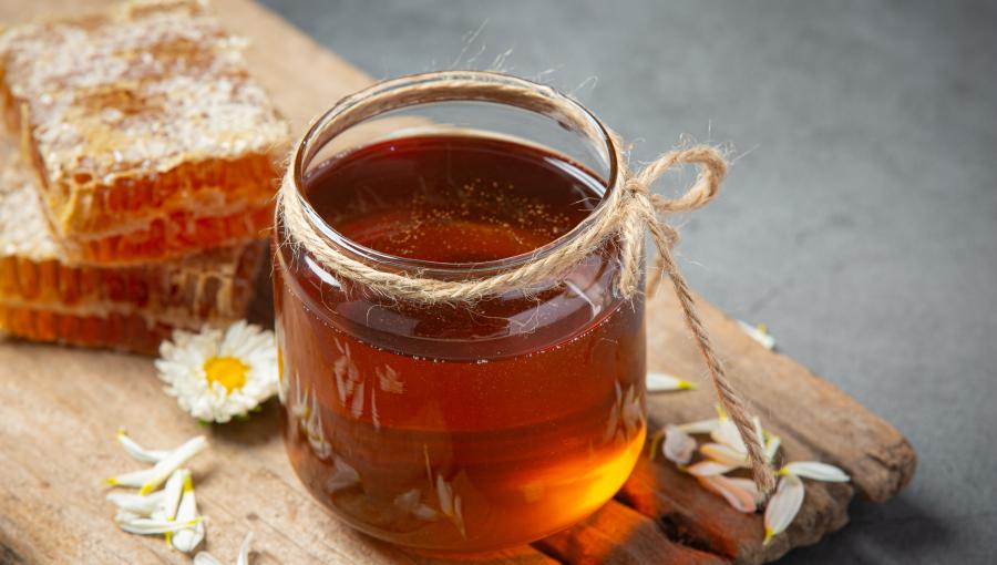 صورة تعبيرية لوعاء مليء بالعسل