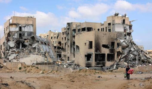 عمارات سكنية قصفها الاحتلال في منطقة بيت لاهيا شمال قطاع غزة | المصدر: وكالة الأنباء الفرنسية