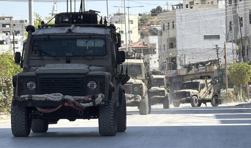 آليات ومدرعات جيش الاحتلال خلال أحد الاقتحامات السابقة في الضفة آليات ومدرعات جيش الاحتلال خلال أحد الاقتحامات السابقة في الضفة | المصدر: الأناضول