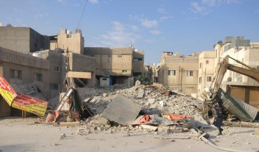 إحدى البنايات التي تم هدمها لأنها آيلة للسقوط | أرشيفية