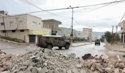 آليات الاحتلال خلال اقتحام بلدة قباطية قرب جنين | رويترز