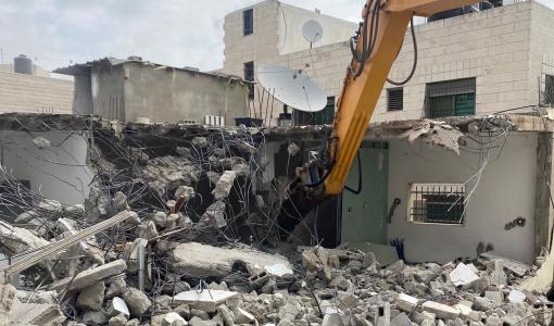 تعبيرية: آلية للاحتلال تنفذ عملية هدم منزل بوقت سابق في الضفة الغربية | المركز الفلسطيني للإعلام